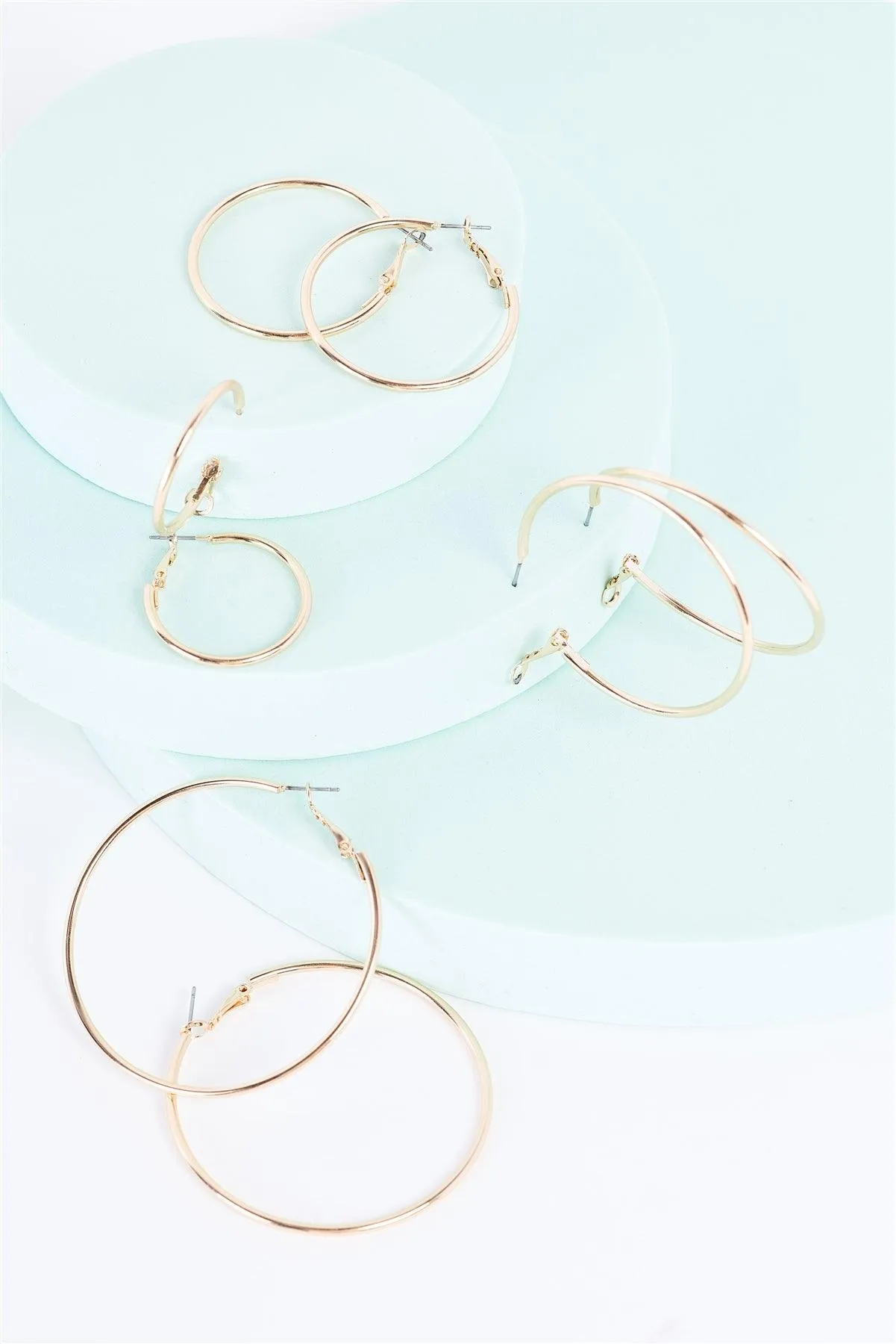 Gold Large To Small Hoop Earrings Set Of Four