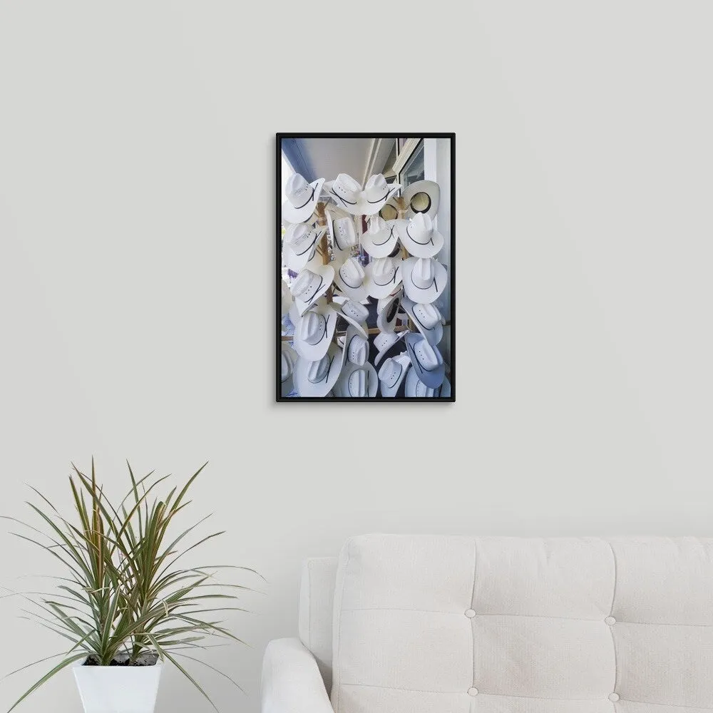 "Cowboy hats hanging in a hat shop, Texas, USA" Black Float Frame Canvas Art